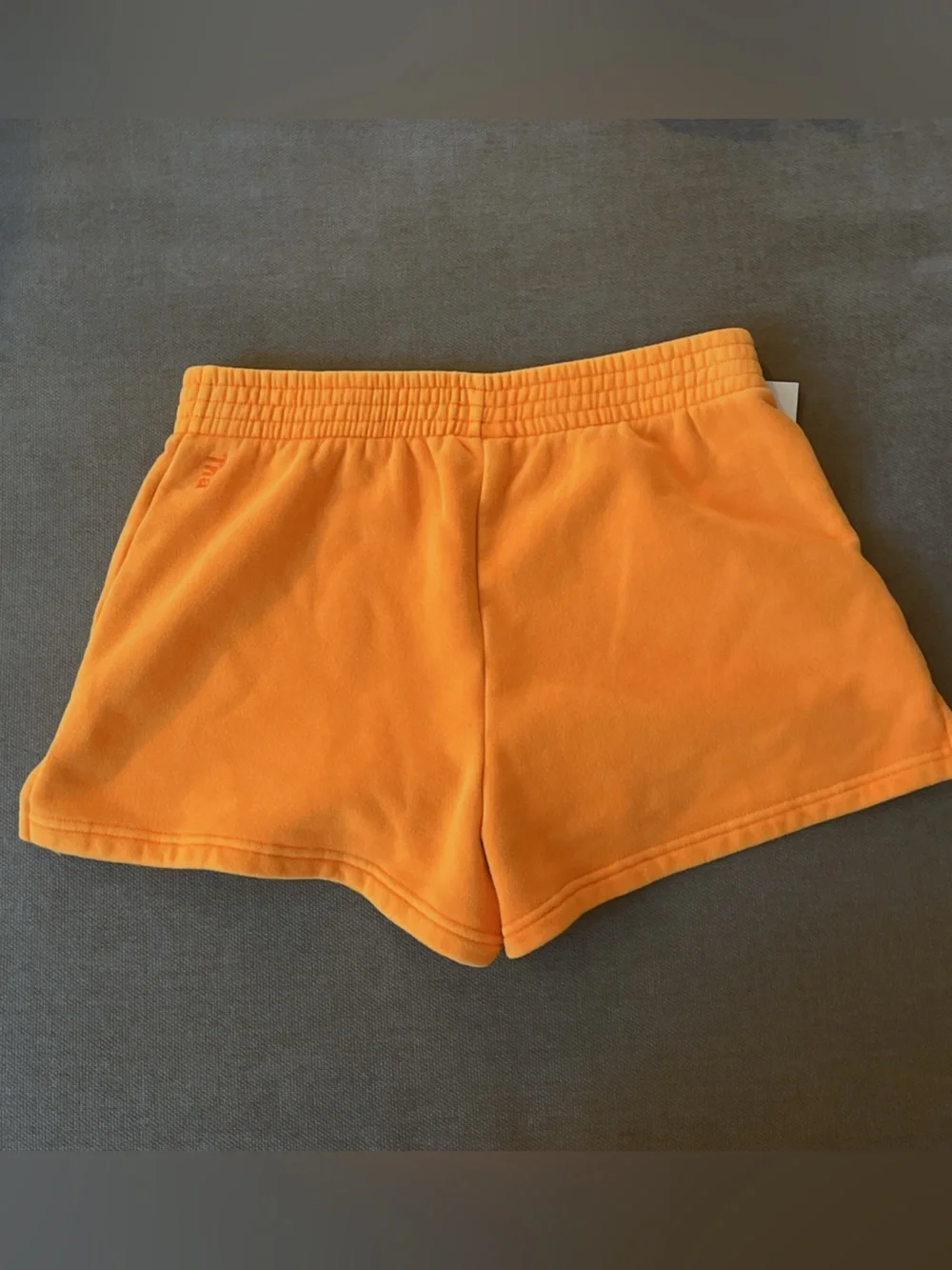 Aritzia Cozy Fleece orange shorts